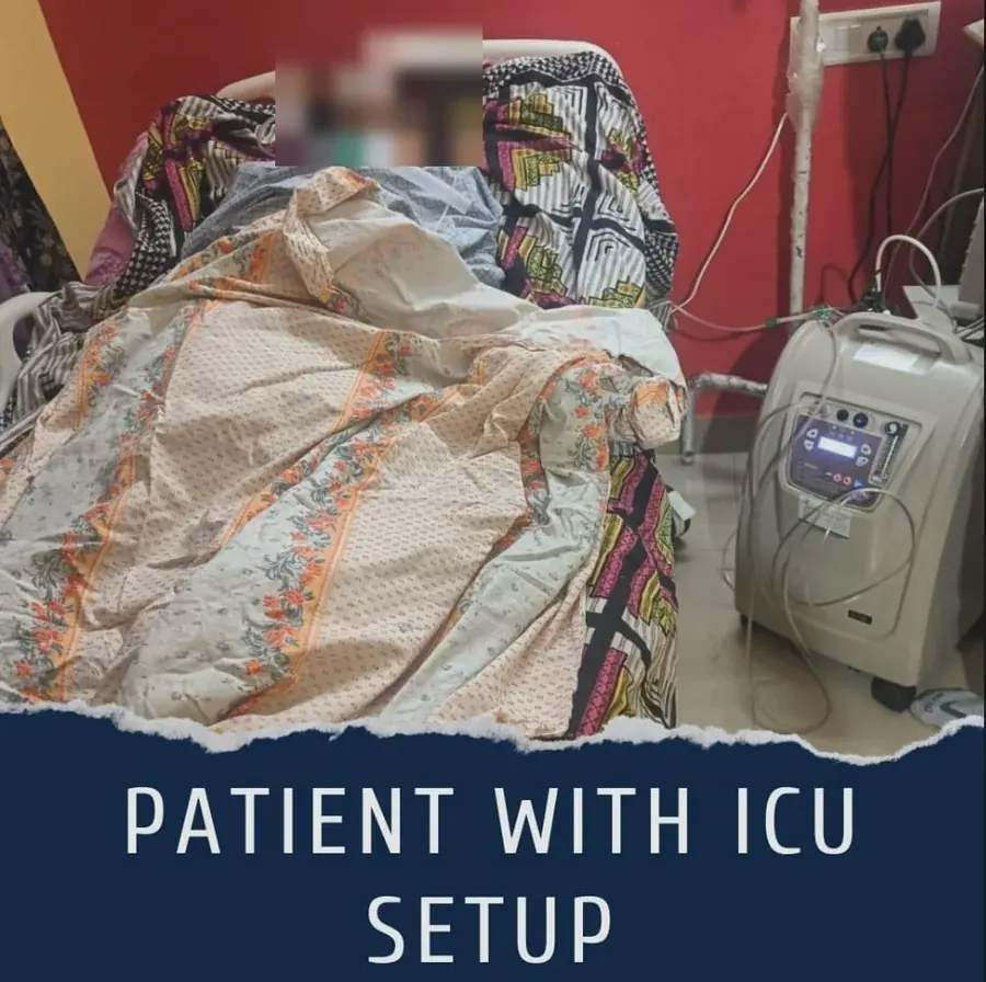 Patient resting at home with a Varolyn ICU-level home-care setup including oxygen concentrator.