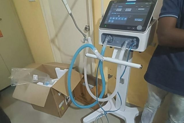 Home Setup — Varolyn home care: ICU-level respiratory equipment being prepared in a patient's room.
